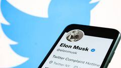 Elon Musk's Twitter account displayed on a phone screen and Twitter logo displayed on a laptop screen are seen in this illustration photo taken in Krakow, Poland on November 1, 2022. (Photo by Jakub Porzycki/NurPhoto via Getty Images)