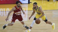 Golden State Warriors&#039; Stephen Curry, right, drives to the basket against the Denver Nuggets&#039; Facundo Campazzo during the first half an NBA basketball game in San Francisco, Friday, April 23, 2021. (AP Photo/Jed Jacobsohn)