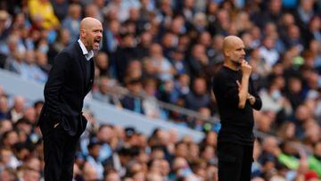 MANCHESTER, ENGLAND - OCTOBER 02: Manager Erik ten Hag of Manchester United and Manager Pep Guardiola of Manchester City watch from the touchling during the Premier League match between Manchester City and Manchester United at Etihad Stadium on October 02, 2022 in Manchester, England. (Photo by Jared Martinez/Manchester United via Getty Images)