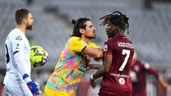TURIN, ITALY - JANUARY 15: Dimitris Nikolaou of Spezia Calcio reacts with Yann Karamoh of Torino FC during the Serie A match between Torino FC and Spezia Calcio at Stadio Olimpico di Torino on January 15, 2023 in Turin, Italy. (Photo by Valerio Pennicino/Getty Images)