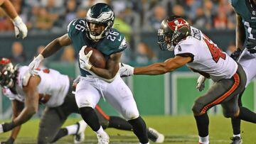 Oct 14, 2021; Philadelphia, Pennsylvania, USA; Philadelphia Eagles running back Miles Sanders (26) carries the ball past Tampa Bay Buccaneers cornerback Ross Cockrell (43) during the fourth quarter at Lincoln Financial Field. 