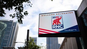 Signs for the 2020 Republican National Convention outside of the Charlotte Convention Center in Charlotte, North Carolina, on August 22, 2020. - The Republican National Convention is scheduled for August 24 to 27, 2020. (Photo by Logan Cyrus / AFP)