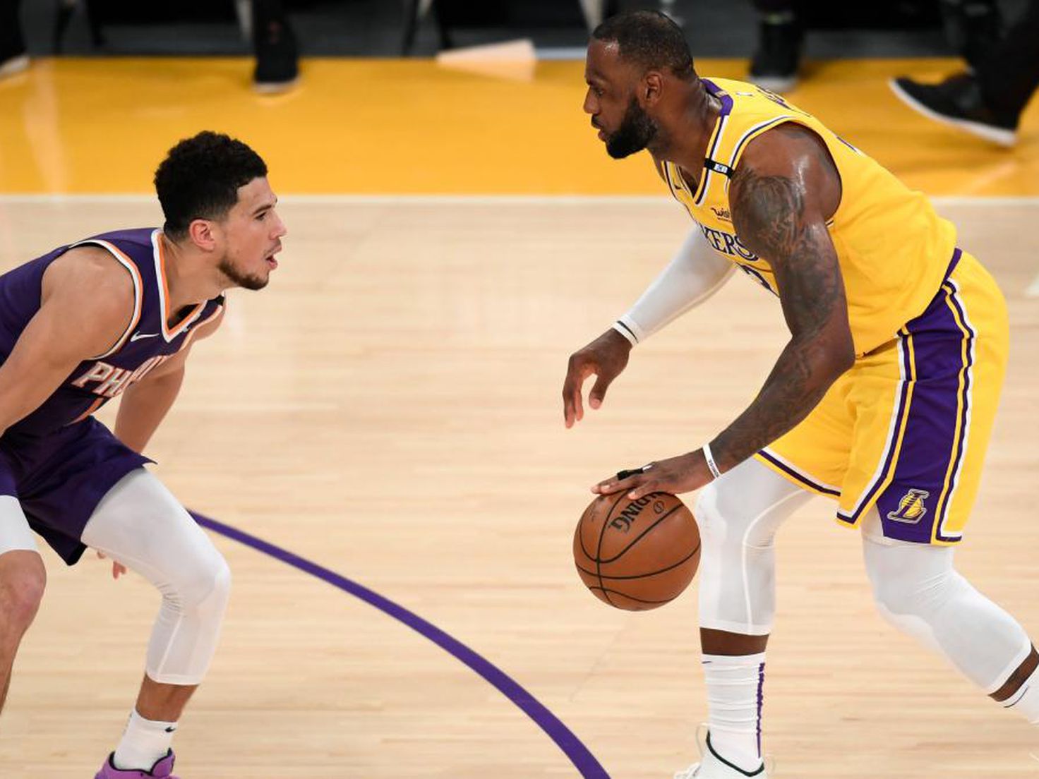 LeBron James congratulated Devin Booker post-game with a signed