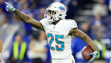 INDIANAPOLIS, IN - NOVEMBER 25:  Xavien Howard #25 of the Miami Dolphins celebrates after intercepting a pass in the final minute of the first half against the Indianapolis Colts at Lucas Oil Stadium on November 25, 2018 in Indianapolis, Indiana.  (Photo by Andy Lyons/Getty Images)