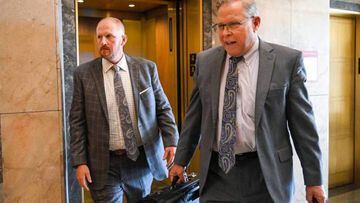 Britt Reid, left, walks to a courtroom with his attorney J.R. Hobbs, right, on Tuesday at the Jackson County Courthouse to be sentenced for a drunk driving conviction. The former assistant coach and son of head coach Andy Reid in September pleaded guilty to driving while intoxicated and causing a 2021 crash that severely injured a 5-year-old girl. (Tammy Ljungblad/The Kansas City Star/Tribune News Service via Getty Images)