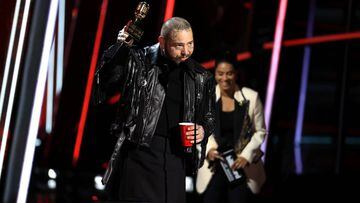 Post Malone accepts the Top Male Artist award onstage for the 2020 Billboard Music Awards broadcast on October 14, 2020 at the Dolby Theatre in Los Angeles, California, U.S. Christopher Polk/NBC/Handout via REUTERS EDITORIAL USE ONLY. NO RESALES. NO ARCHI