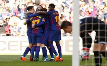 Paco Alcácer celebrates scoring Barcelona's first goal.