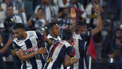 Alianza Lima's players celebrate after scoring a goal during the Copa Libertadores group stage second leg football match between Peru's Alianza Lima and Paraguay's Libertad at the Alejandro Villanueva stadium in Lima, on May 23, 2023. (Photo by CRIS BOURONCLE / AFP)