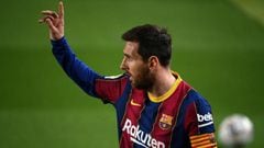 (FILES) In this file photo taken on February 24, 2021 Barcelona&#039;s Argentinian forward Lionel Messi gestures during the Spanish league football match between FC Barcelona and Elche CF at the Camp Nou stadium in Barcelona. - Lionel Messi will end his 2