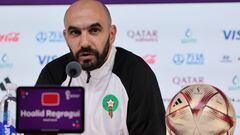 Morocco's coach Walid Regragui gives a press conference at the Qatar National Convention Center (QNCC) in Doha on December 16, 2022, on the eve of the Qatar 2022 World Cup third place football match between Croatia and Morocco. (Photo by KARIM JAAFAR / AFP)