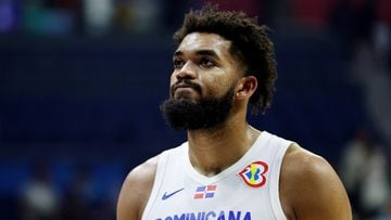Dominican Republic's Karl-Anthony Towns looks dejected after the match
