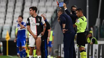 Juventus&#039; Argentinian forward Paulo Dybala  (L) leaves the pitch after an injury during the Italian Serie A football match between Juventus and Sampdoria played behind closed doors on July 26, 2020 at the Allianz Stadium in Turin. (Photo by MARCO BER