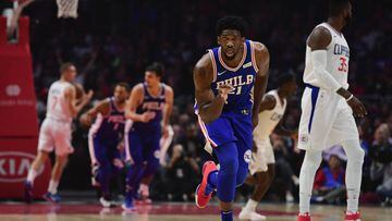 LOS ANGELES, CA - NOVEMBER 13: Joel Embiid #21 of the Philadelphia 76ers reacts to his three pointer during the first half against the LA Clippers at Staples Center on November 13, 2017 in Los Angeles, California.   Harry How/Getty Images/AFP == FOR NEWSPAPERS, INTERNET, TELCOS &amp; TELEVISION USE ONLY ==