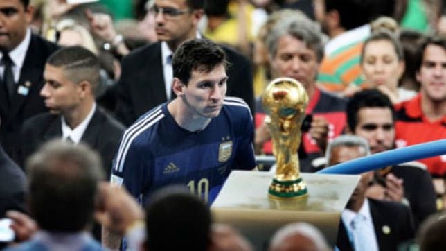 messi holding fifa world cup