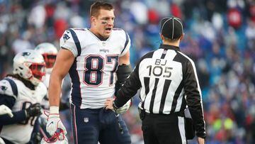 ORCHARD PARK, NY - DECEMBER 3: Rob Gronkowski #87 of the New England Patriots talks with back judge Dino Paganelli #105 during the fourth quarter against the Buffalo Bills on December 3, 2017 at New Era Field in Orchard Park, New York.   Tom Szczerbowski/Getty Images/AFP == FOR NEWSPAPERS, INTERNET, TELCOS &amp; TELEVISION USE ONLY ==