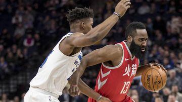 Feb 13, 2018; Minneapolis, MN, USA; Houston Rockets guard James Harden (13) drives to the basket past Minnesota Timberwolves guard Jimmy Butler (23) in the first half at Target Center. Mandatory Credit: Jesse Johnson-USA TODAY Sports