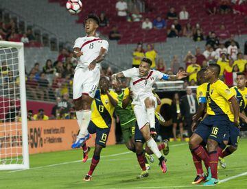 Peru player Renato Tapia rises for a header