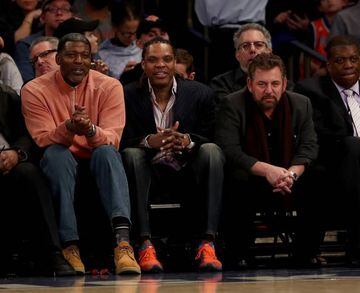 Former New York Knicks playes Larry Johnson and Latrell Spreewell and Knicks owner James Dolan attend the game between the New York Knicks and the San Antonio Spurs