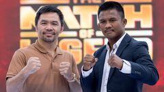 Filipino boxer Manny Pacquiao (L) and Thai Muay Thai fighter Buakaw Banchamek (R) pose for photographs during a press conference in Bangkok on July 21, 2023, to promote their 2024 fight. (Photo by Jack TAYLOR / AFP)