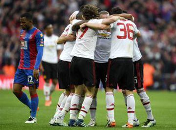 United hug s the final whistle blows 