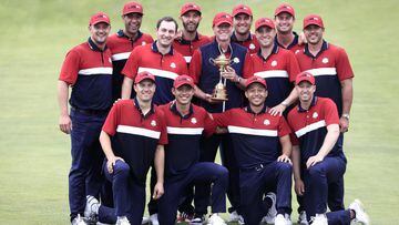 The US team celebrates with the Ryder Cup trophy