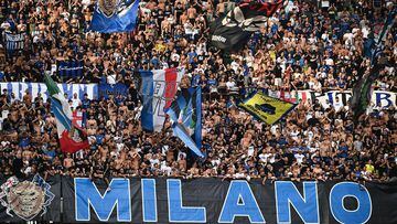 Milan's supporters cheer during the Italian Serie A football match between Inter Milan and Fiorentina at San Siro stadium in Milan on September 3, 2023. (Photo by Isabella BONOTTO / AFP)