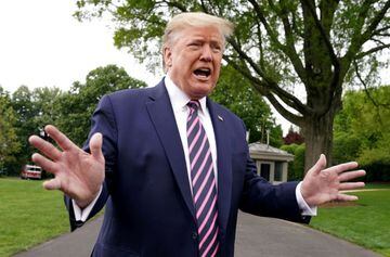 FILE PHOTO: U.S. President Donald Trump speaks to reporters as he departs on travel to Phoenix, Arizona from the South Lawn of the White House in Washington, U.S., May 5, 2020. REUTERS/Kevin Lamarque/File Photo