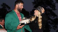 AUGUSTA, GEORGIA - APRIL 09: Jon Rahm of Spain, while holding the Masters trophy, laughs with his wife, Kelley during the Green Jacket Ceremony after winning the 2023 Masters Tournament at Augusta National Golf Club on April 09, 2023 in Augusta, Georgia.   Christian Petersen/Getty Images/AFP (Photo by Christian Petersen / GETTY IMAGES NORTH AMERICA / Getty Images via AFP)