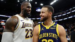 LeBron James #23 of the Los Angeles Lakers and Stephen Curry #30 of the Golden State Warriors talk to each other after the Lakers beat the Warriors in double overtime at Chase Center on January 27, 2024 in San Francisco, California.