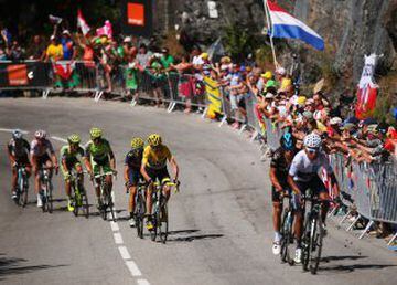 MODANE VALFREJUS, FRANCE - JULY 25:  Race leader Chris Froome (centre/yellow) of Great Britain and Team Sky loses some distance as Nairo Quintana (R) of Colombia and Movistar Team attacks on the Alpe d'Huez during the twentieth stage of the 2015 Tour de France, a 110.5 km stage between Modane Valfrejus and L'Alpe d'Huez on July 25, 2015 in Modane Valfrejus, France.  (Photo by Bryn Lennon/Getty Images)