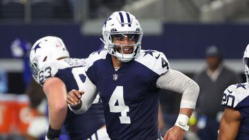 ARLINGTON, TEXAS - NOVEMBER 24: Dak Prescott #4 of the Dallas Cowboys reacts after a touchdown during the second half in the game against the New York Giants at AT&T Stadium on November 24, 2022 in Arlington, Texas.   Richard Rodriguez/Getty Images/AFP (Photo by Richard Rodriguez / GETTY IMAGES NORTH AMERICA / Getty Images via AFP)