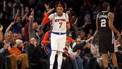 Feb 12, 2017; New York, NY, USA; New York Knicks forward Carmelo Anthony (7) reacts after hitting a three-point basket during the second half against the San Antonio Spurs at Madison Square Garden. Mandatory Credit: Adam Hunger-USA TODAY Sports
