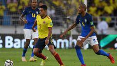 Colombia&#039;s Radamel Falcao (L) and Brazil&#039;s Fabinho (R) vie for the ball during their South American qualification football match for the FIFA World Cup Qatar 2022 at the Metropolitano stadium in Barranquilla, Colombia, on October 10, 2021. (Phot