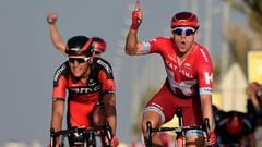 Norwegian Alexander Kristoff of team Katusha gestures as he crosses the finish line ahead of BMC&#039;s Belgium Greg Van Avermaet during the fourth stage of the 15th Tour of Qatar.