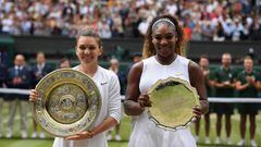 Romania&#039;s Simona Halep (L) poses with the Venus Rosewater Dish trophy (L) and US player Serena Williams poses with the runners up trophy after Halep won their women&#039;s singles final on day twelve of the 2019 Wimbledon Championships at The All England Lawn Tennis Club in Wimbledon, southwest London, on July 13, 2019. (Photo by Ben STANSALL / AFP) / RESTRICTED TO EDITORIAL USE