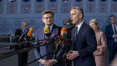 HANDOUT - 07 April 2022, Belgium, Brussels: NATO Secretary General Jens Stoltenberg (R) and Ukrainian Foreign Minister Dmytro Kuleba talk to the press upon arrival for a meeting on the sidelines of the meetings of the NATO Ministers of Foreign Affairs. Ph