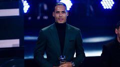 PARIS, FRANCE - FEBRUARY 27: Virgil Van Dijk of Liverpool poses for photos with his trophy of FIFA Men's World 11 during The Best FIFA Football Awards 2022 on February 27, 2023 in Paris, France. (Photo by Marcio Machado/Eurasia Sport Images/Getty Images)