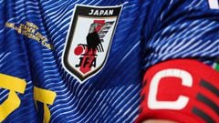 DOHA, QATAR - NOVEMBER 27: A Japan football shirt is seen worn by a supporter during the FIFA World Cup Qatar 2022 Group E match between Japan and Costa Rica at Ahmad Bin Ali Stadium on November 27, 2022 in Doha, Qatar. (Photo by Alex Livesey - Danehouse/Getty Images)
