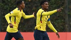 Ecuador's Justin Cuero (R) celebrates after scoring against Paraguay during their South American U-20 football championship final round match at the Metropolitano de Techo stadium in Bogota, on February 12, 2023. (Photo by Juan BARRETO / AFP)
