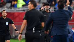 Monterrey&#039;s coach Antonio Mohamed (R) argues with Liverpool&#039;s German manager Jurgen Klopp (2nd-R) during the 2019 FIFA Club World Cup semi-final football match between Mexico&#039;s Monterrey and England&#039;s Liverpool at the Khalifa Internati