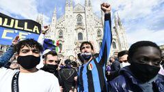 Inter Milan fans celebrate winning Serie A outside the Duomo di Milano. 