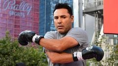 (FILES) In this file photo taken on August 24, 2021 Former US Olympics Gold medalist professional boxer Oscar De La Hoya stretches before sparring with his partner during a media workout in Los Angeles. - Former boxing great Oscar De La Hoya said Friday h