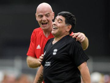 FIFA President Gianni Infantino (L) congratulates former Argentinian football star Diego Maradona after he scored a goal during &quot;The Gianni&#039;s game, the match of legends&quot;, a football match with football legends in honour of FIFA&#039;s President on July 7, 2017 in Brig. / AFP PHOTO / Fabrice COFFRINI