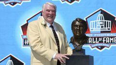 (FILES) In this file photo taken on August 5, 2006 coach John Madden poses with his bust after his induction during the Class of 2006 Pro Football Hall of Fame Enshrinement Ceremony at Fawcett Stadium in Canton, Ohio. - NFL coaching great John Madden, whose influence extended through a long broadcasting career and into the current age of video games, has died at the age of 85, the league said Tuesday. (Photo by Doug Benc / GETTY IMAGES NORTH AMERICA / AFP)