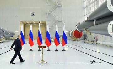 Russian President Vladimir Putin walks to deliver a speech, as he visits the Vostochny cosmodrome on 12 April 2022.