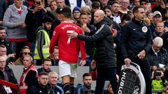 Manchester United's Cristiano Ronaldo with manager Erik ten Hag after being substituted during the Premier League match at Old Trafford, Manchester. Picture date: Sunday October 16, 2022. (Photo by Martin Rickett/PA Images via Getty Images)