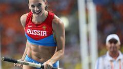 Russia&#039;s Yelena Isinbayeva celebrates after clearing the bar during the women&#039;s pole vault final at the 2013 IAAF World Championships at the Luzhniki stadium in Moscow on August 13, 2013. Isinbayeva won the gold medal. AFP PHOTO / FRANCK FIFE
