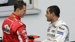 Michael Schumacher y Juan Pablo Montoya en 2005.
