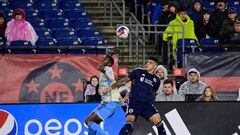 Oct 21, 2023; Foxborough, Massachusetts, USA; Philadelphia Union defender Damion Lowe (17) (left) and New England Revolution forward Gustavo Bou (7) (right) battle for the ball during the first half at Gillette Stadium. Mandatory Credit: Eric Canha-USA TODAY Sports