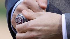 CHICAGO, IL - APRIL 12: President Theo Epstein of the Chicago Cubs adjusts his World Series Championship ring before a game against the Los Angeles Dodgers at Wrigley Field on April 12, 2017 in Chicago, Illinois.   Jonathan Daniel/Getty Images/AFP == FOR NEWSPAPERS, INTERNET, TELCOS &amp; TELEVISION USE ONLY ==